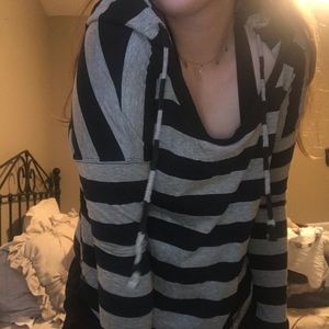 black and gray striped hooded shirt
